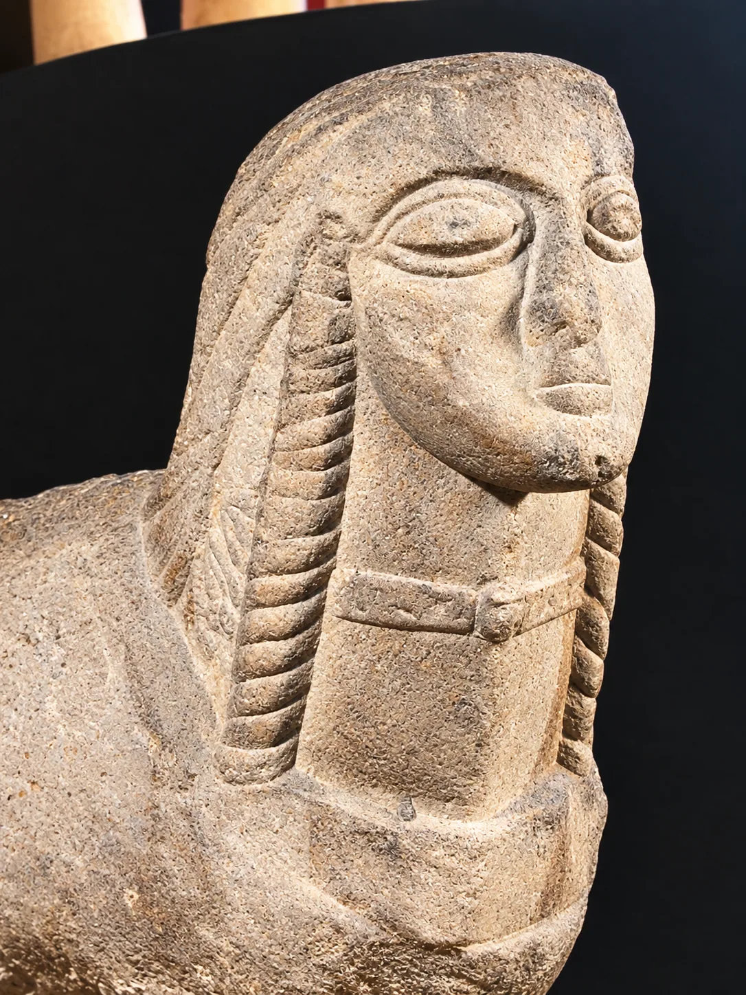 Carved stone head of a Seljuk elite figure showing East Asian facial features